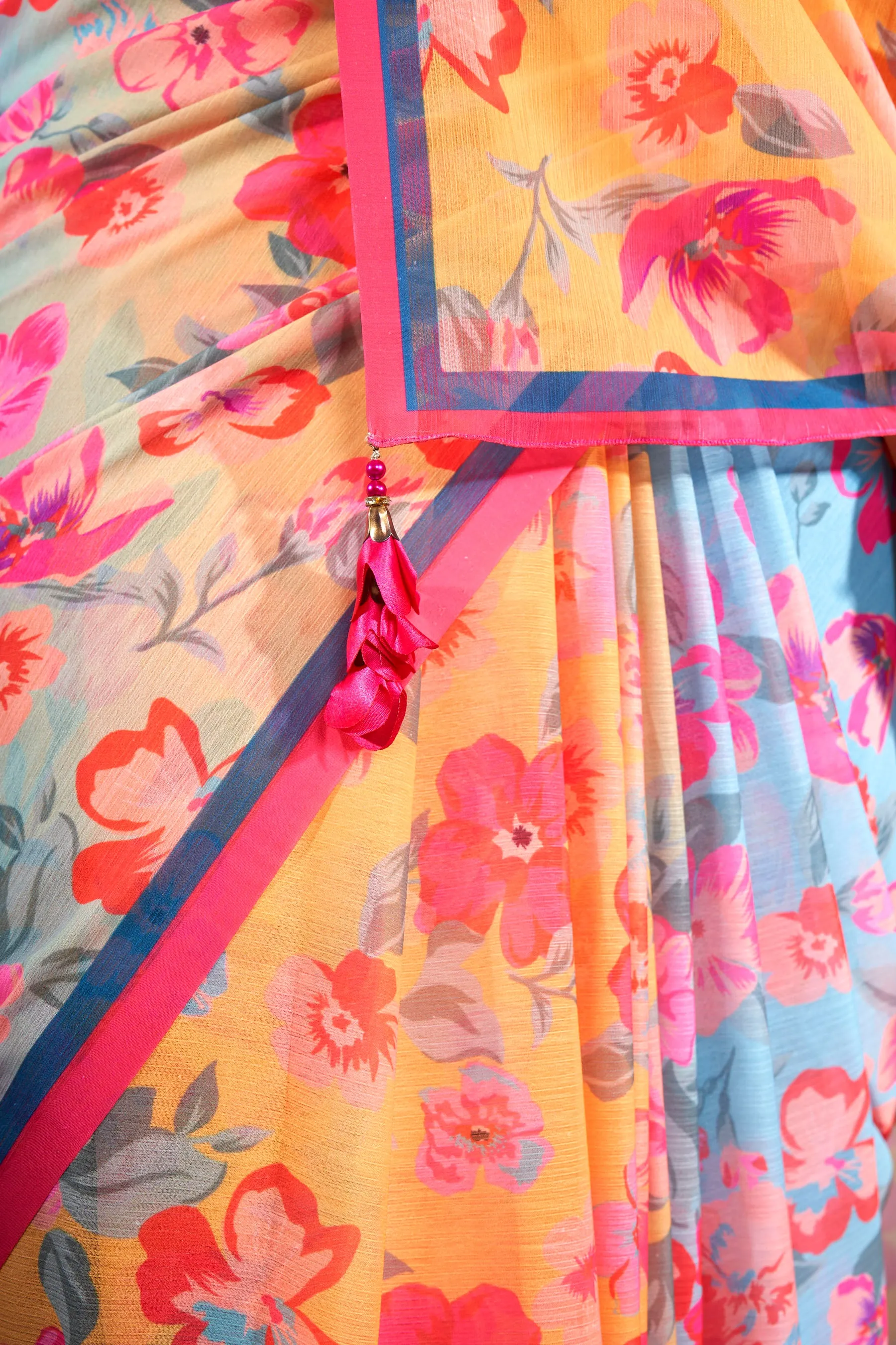 Amber Yellow Floral Printed Chiffon Saree With Latkan
