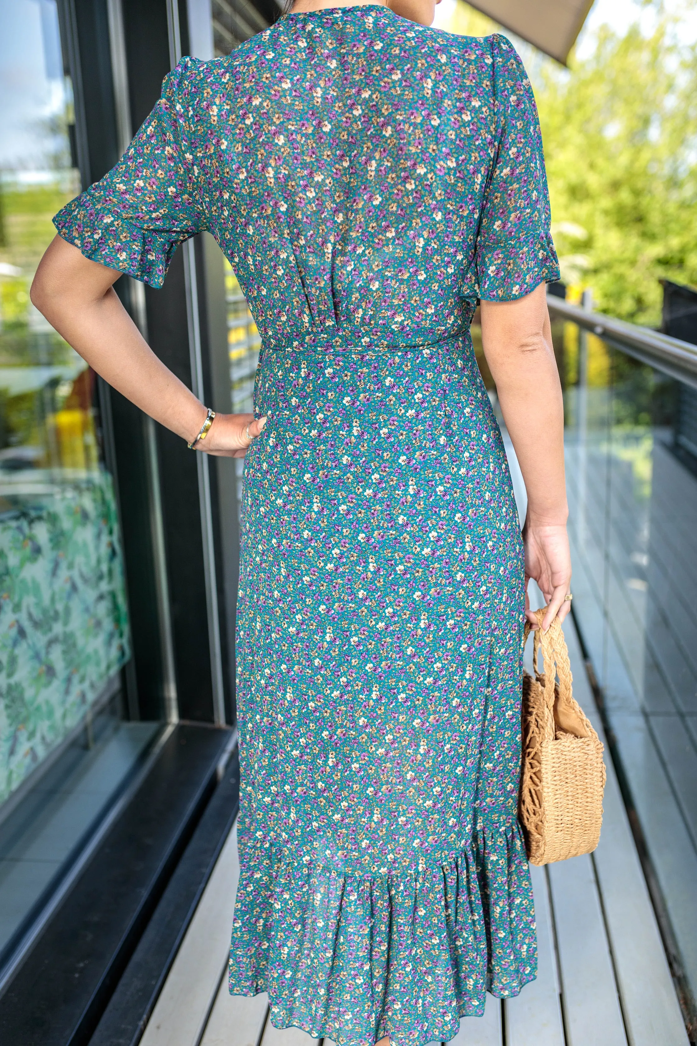 Maisy Frill Hem Wrap Style Maxi Dress In Navy Ditsy Floral Print